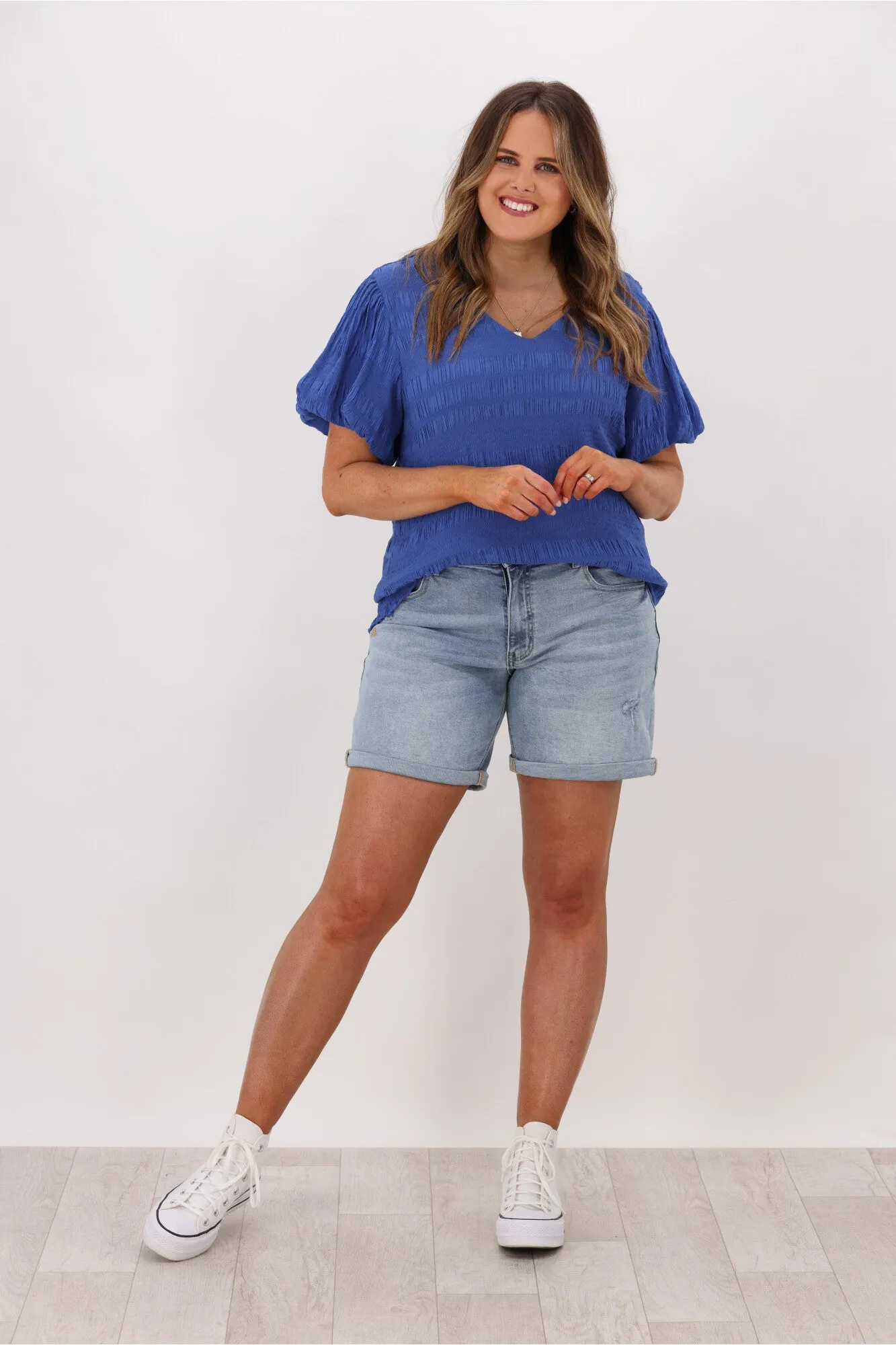 Gloss by Shine On Tina Textured Puffed Sleeve Top Blue sold by Shine On