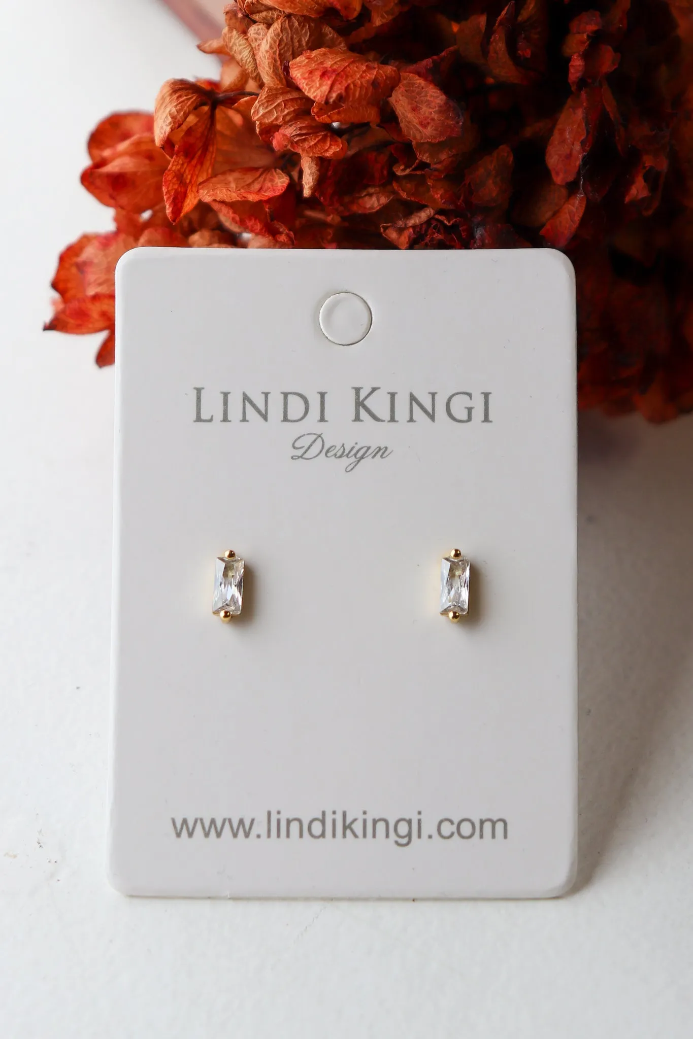 Lindi Kingi Baguette Studs White Zirconia Gold sold by Shine On