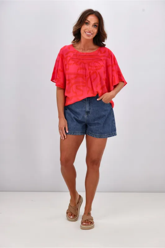 Gloss by Shine On Alesandra Flutter Sleeve Top Pink Red Ribbon Print sold by Shine On