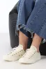 Converse Womens Chuck Taylor All Star Gold Mono Leather Low Top Egret sold by Shine On