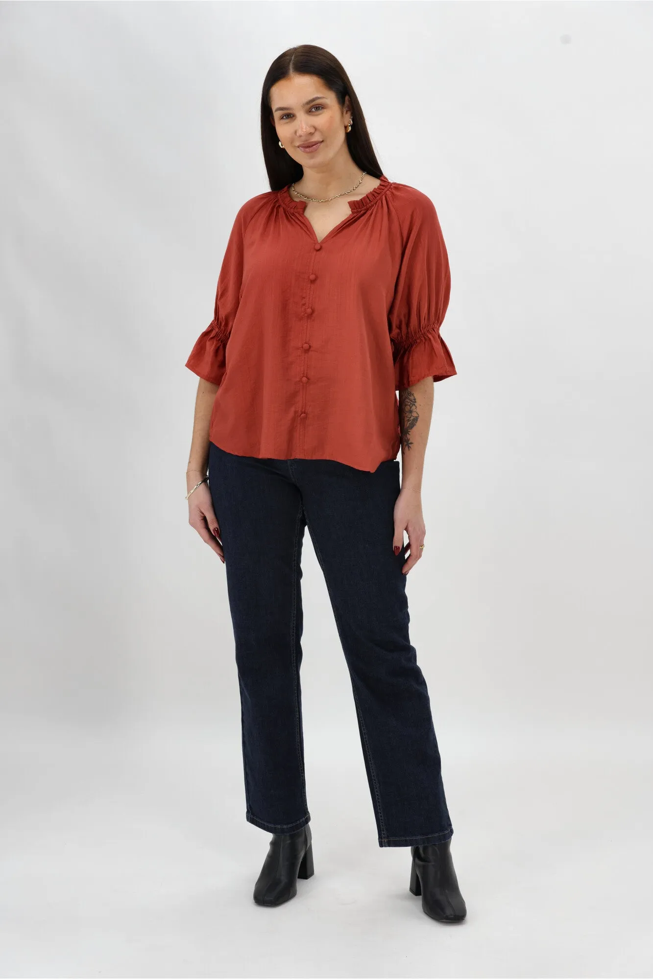 Gloss The Label Sophia Ruffle Neck Blouse Rust sold by Shine On