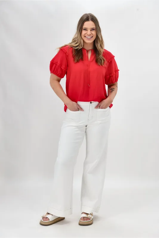 Gloss The Label Clea Frill Detail Puff Sleeve Top Coral sold by Shine On