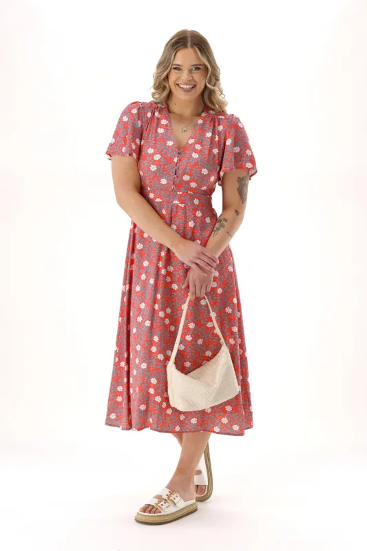 Gloss The Label Cheyenne Flutter Sleeve Dress Orange Floral sold by Shine On