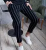 Double stripe casual chinos sold by Shopnova