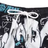 Men's beach pants loose casual cartoon printed shorts sold by Shopnova