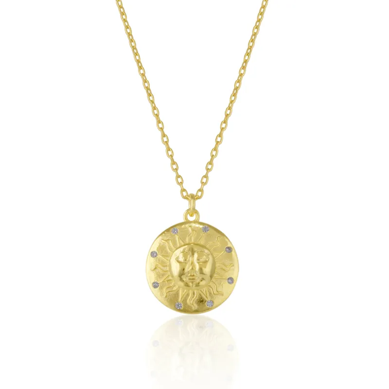 Sun Silhouette Face Embossed Sterling Silver Medal Necklace sold by Spero London