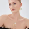 Mother Of Pearl Olive Branch Sterling Silver Earring & Necklace Set sold by Spero London
