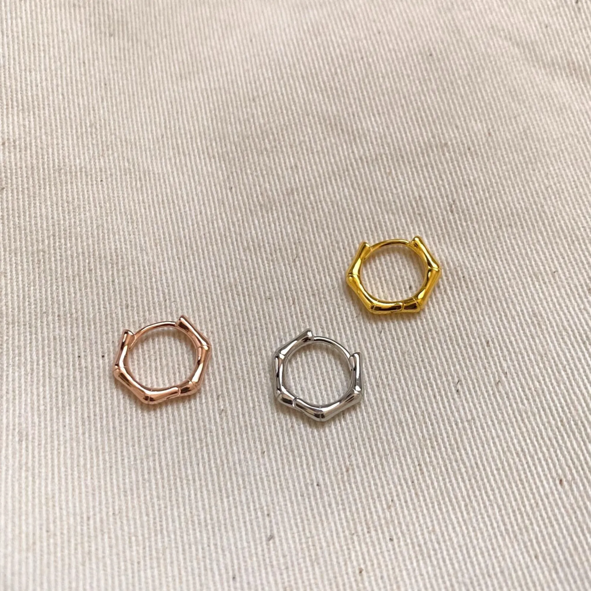 Bone Shape Hexagonal Huggie Hoop Earrings in Sterling Silver sold by Spero London product image thumbnail 4