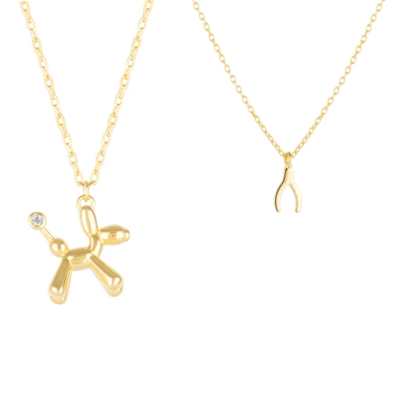 Balloon Dog Poodle & Wishbone Necklace Layering Set in Sterling Silver sold by Spero London