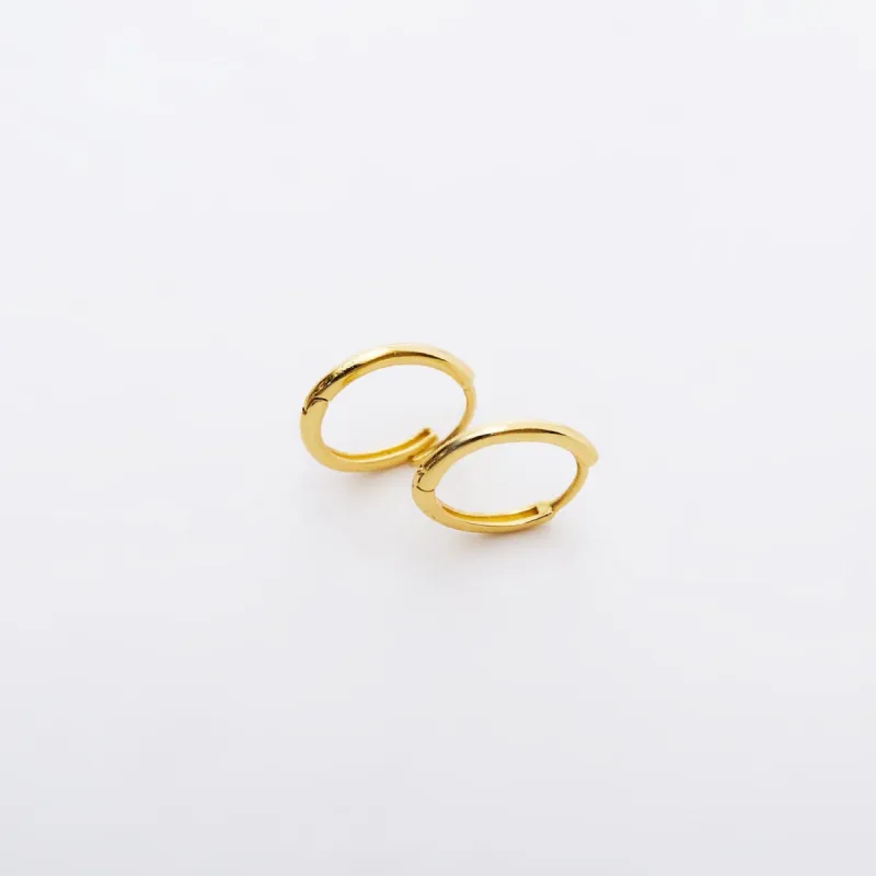 Sterling Silver Oval Hoop Earrings sold by Spero London