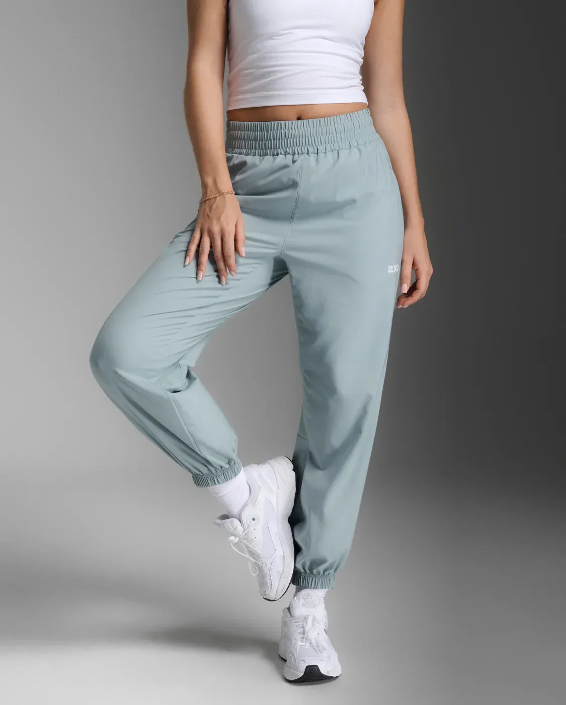 2XU Aero Hi-Rise Woven Jogger-Smoke Blue/White Reflective sold by Sportsmans Warehouse