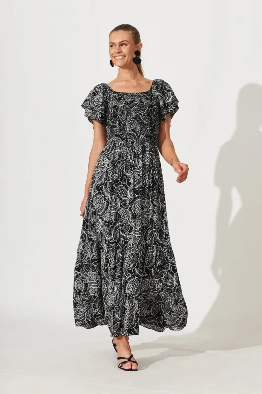 Demi Maxi Dress In Black With White Leaf Print sold by St Frock