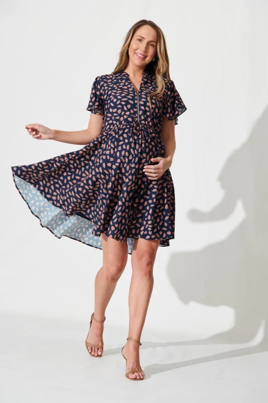 Paulina Dress In Navy With Rust Leaf sold by St Frock