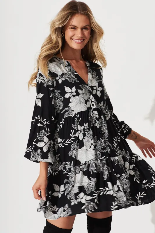Cozumel Smock Dress In Black With White Floral Print sold by St Frock