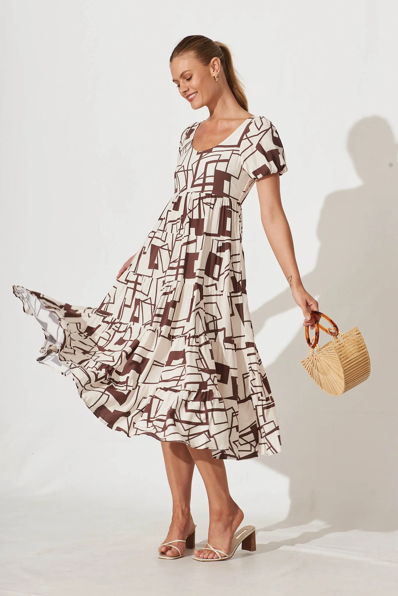Tammie Midi Dress In White With Chocolate Geometric Print sold by St Frock