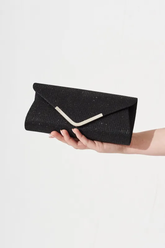 August + Delilah Mahani Clutch Bag In Black sold by St Frock