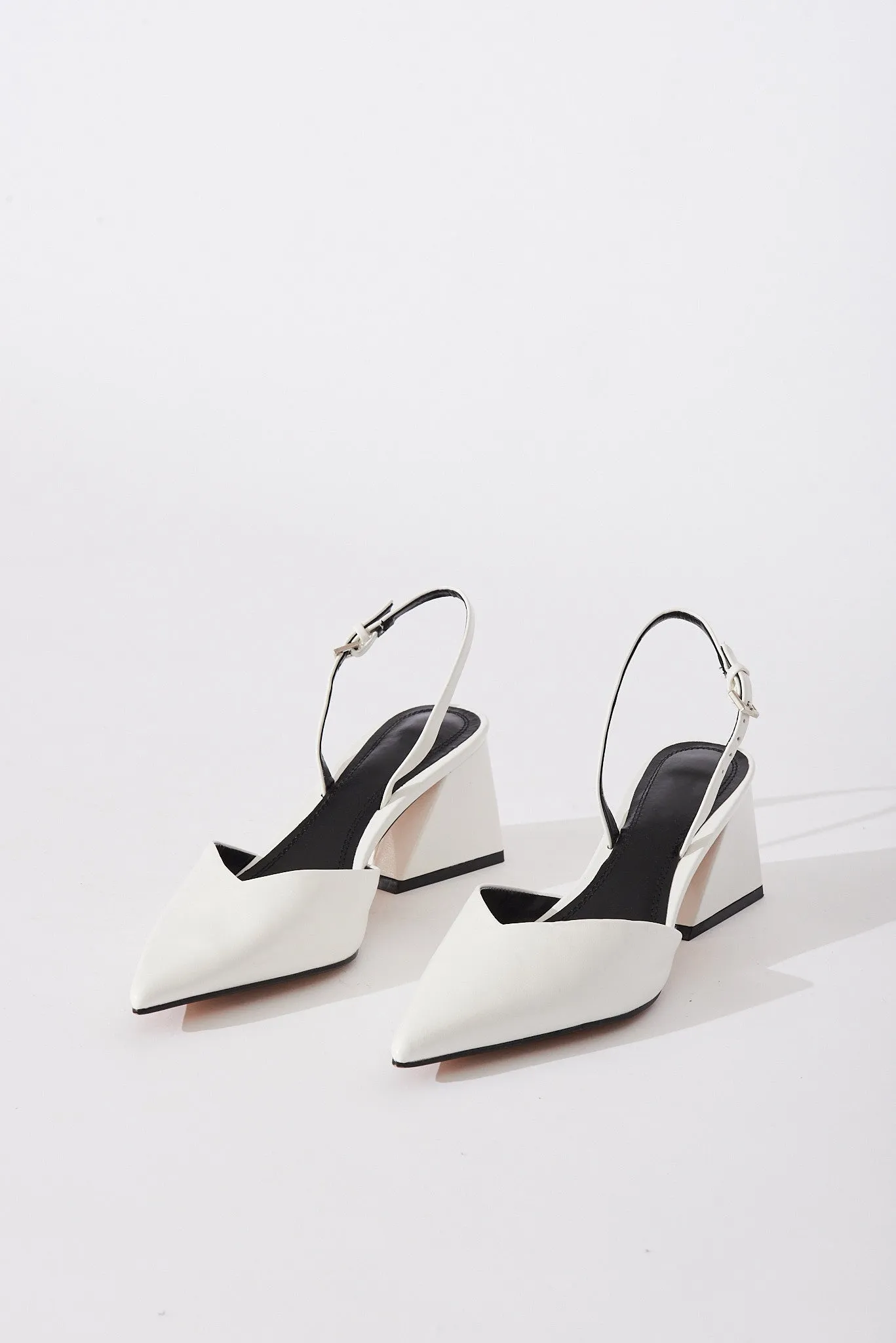 Gavi Closed Toe Slingback Block Heels In White sold by St Frock