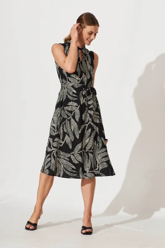 Yasmin Midi Dress In Black With Leaf Print sold by St Frock