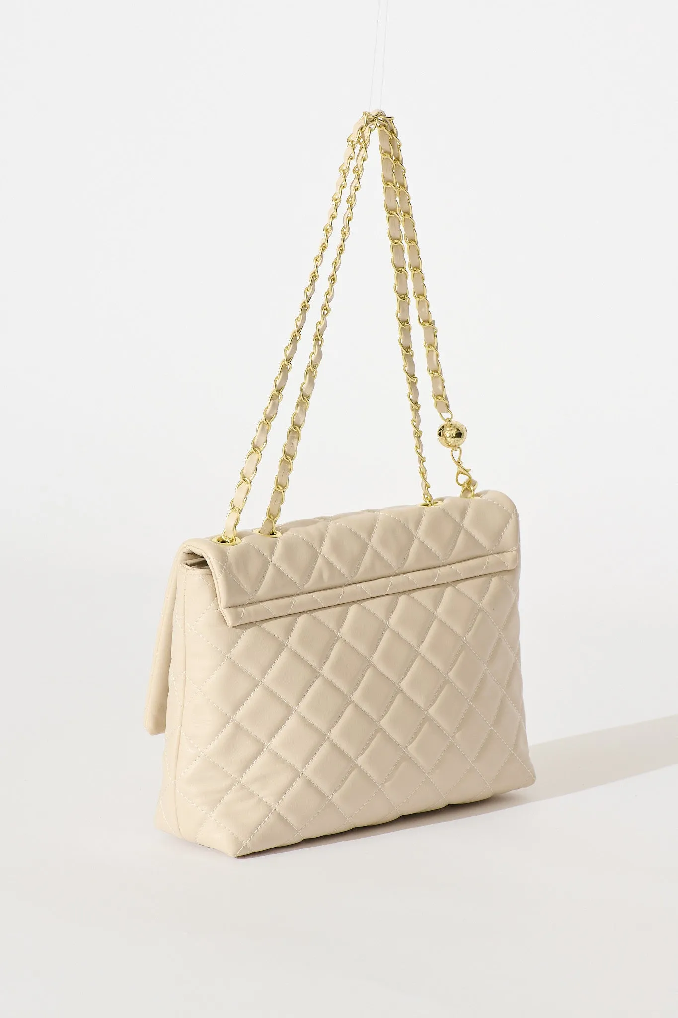 Eliza Quilted Crossbody Bag In Beige sold by St Frock product image thumbnail 5