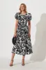 Amori Midi Dress In Black And White Cotton sold by St Frock