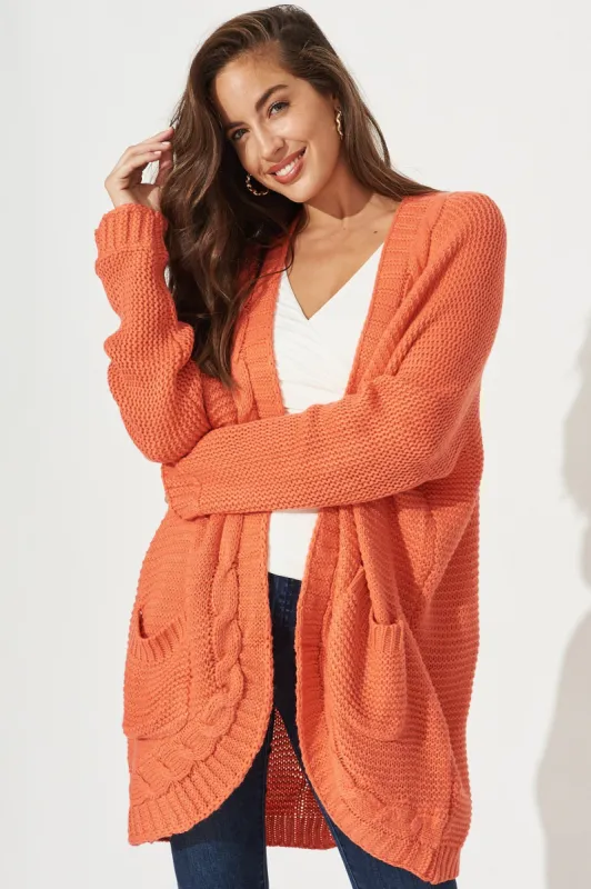 Carmelita Cable Knit Cardigan In Coral sold by St Frock