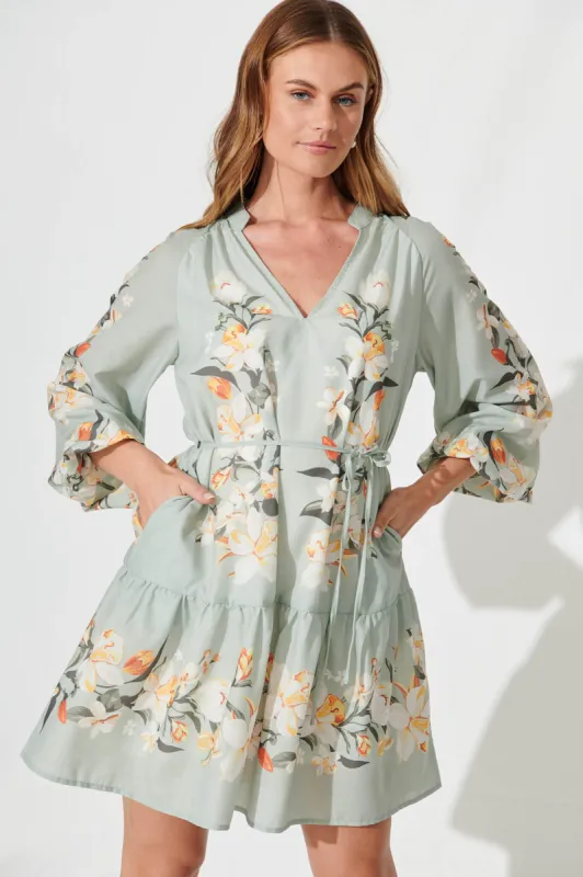 Niko Dress In Sage Green Placement Floral Cotton Blend sold by St Frock