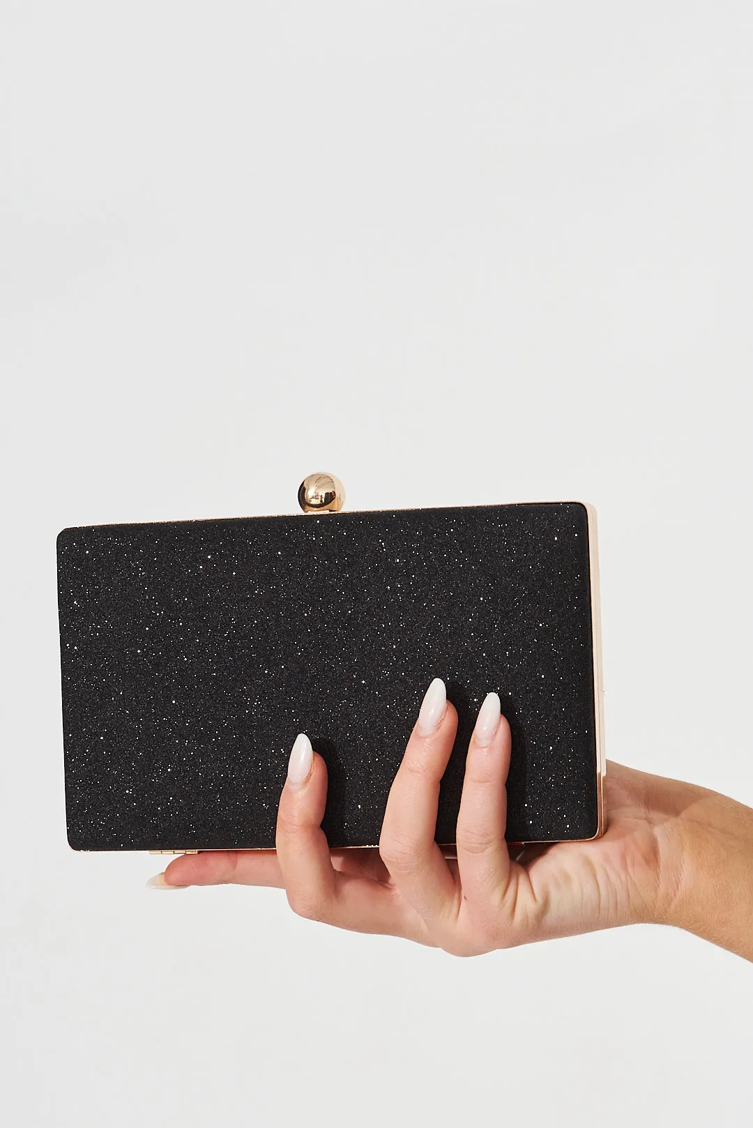 August + Delilah Dianne Clutch Bag In Black Glitter sold by St Frock