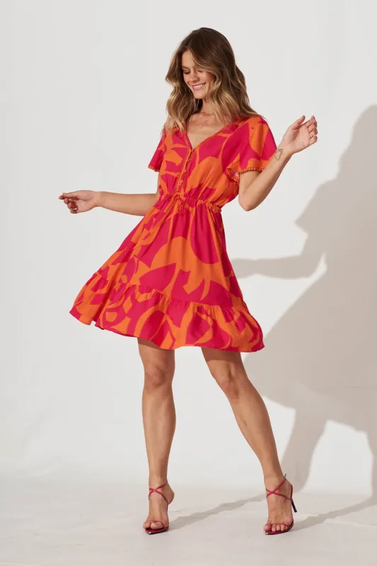 Tara Dress In Tangerine With Pink Print sold by St Frock