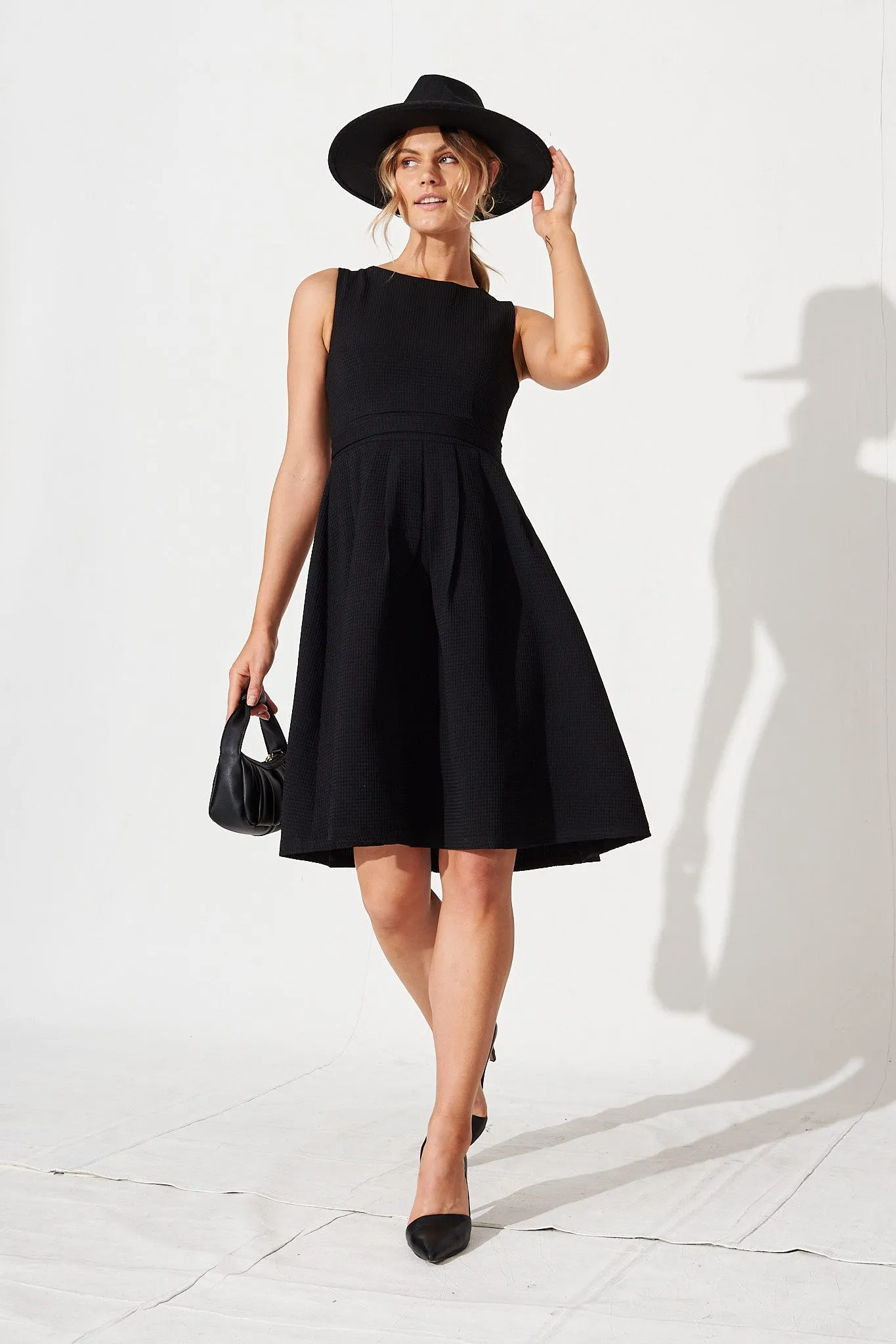 Jardin Dress In Textured Black sold by St Frock