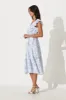 Kona Midi Dress In White With Blue Floral Print sold by St Frock