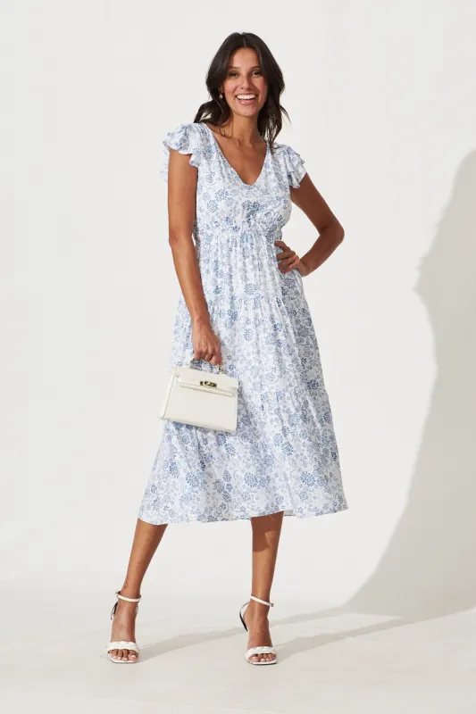 Kona Midi Dress In White With Blue Floral Print sold by St Frock