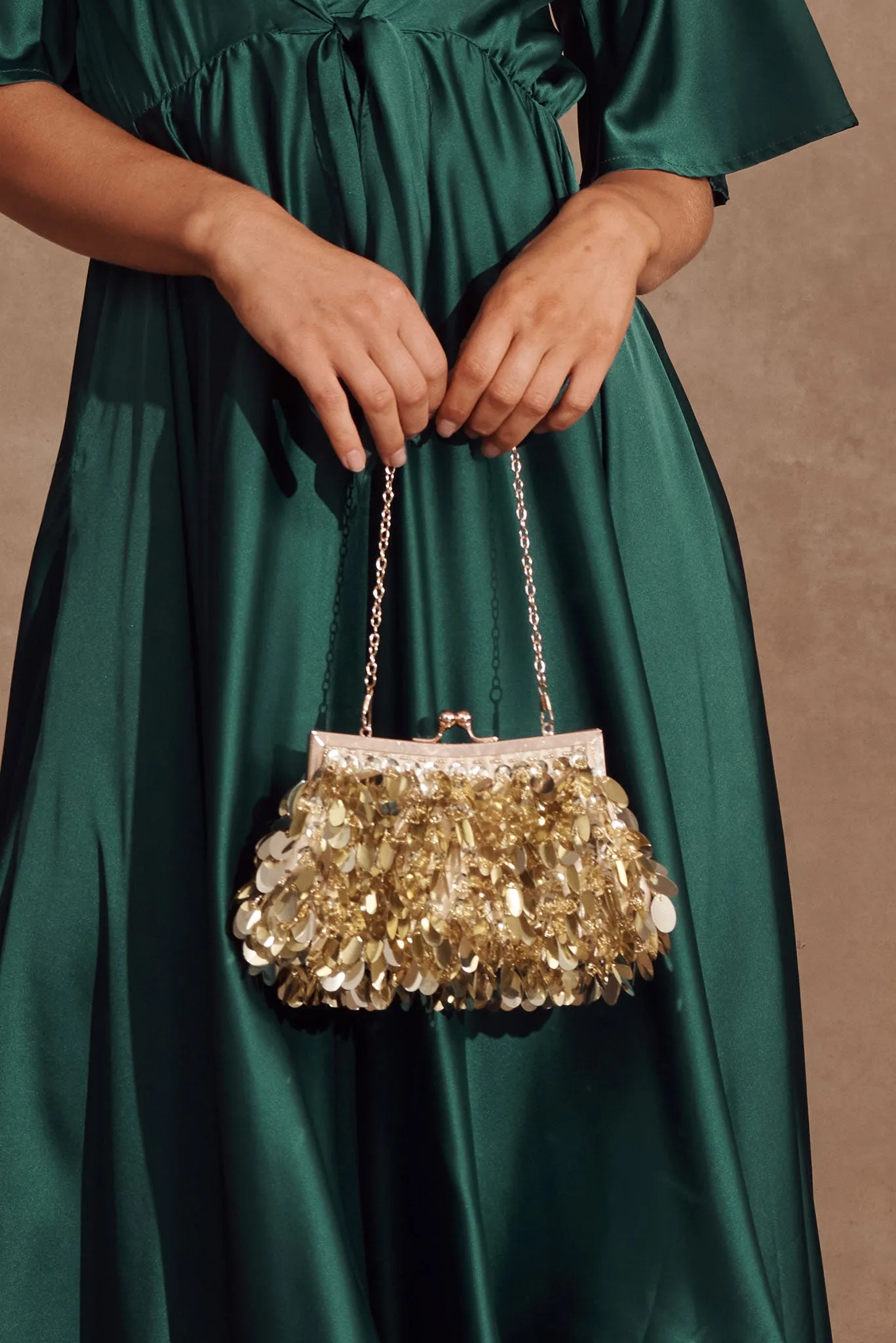 Leah Clutch Bag In Gold Sequin sold by St Frock