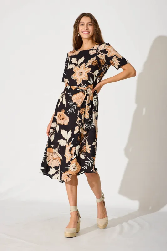 Chambery Midi Dress In Black With Rust Leaf Print sold by St Frock