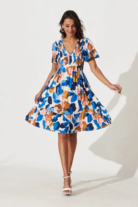 Kamaria Dress In Cream With Cobalt Multi Floral Print sold by St Frock