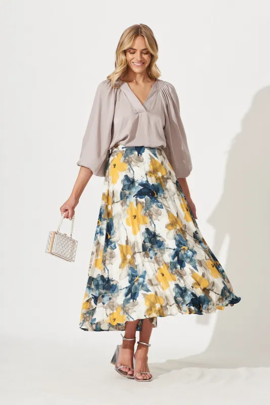 Amary Midi Pleat Skirt In Navy With Yellow Watercolour Print sold by St Frock