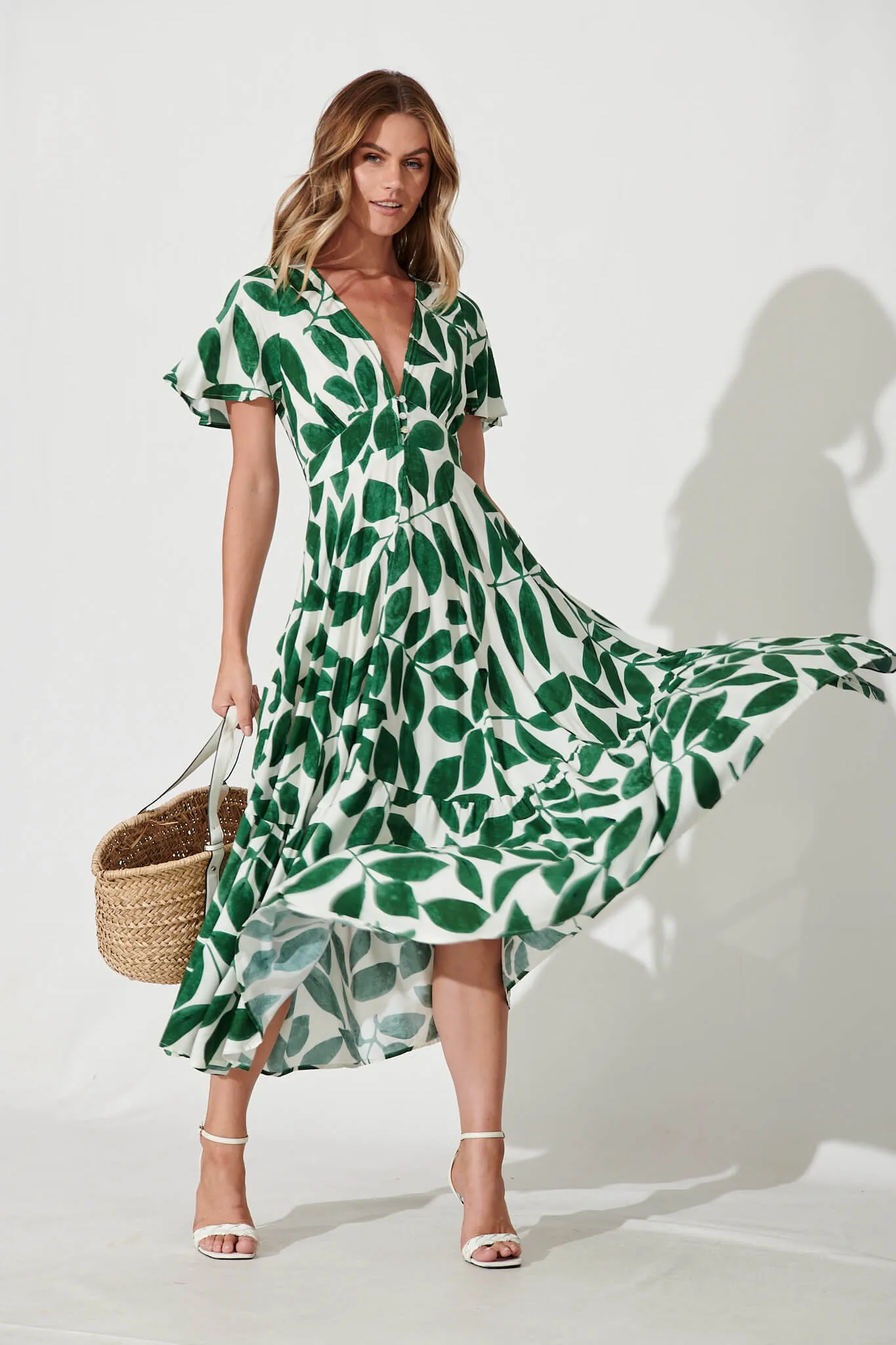 Nevada Maxi Dress In Cream With Green Leaf Print sold by St Frock