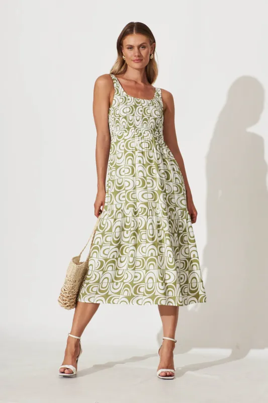 Caribbean Midi Dress In White And Green Geometric sold by St Frock
