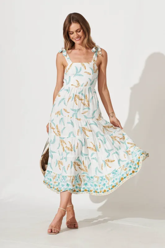 Sunshine Maxi Dress In White With Teal Leaf Print sold by St Frock