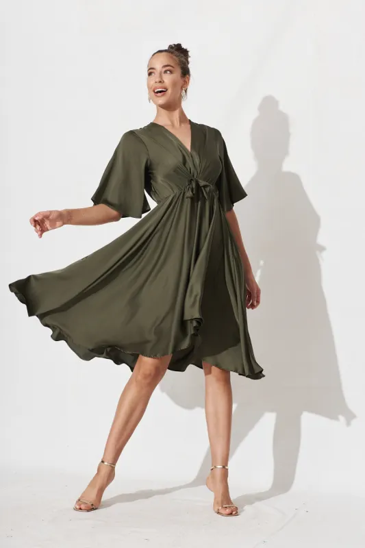Helsinki Dress In Olive Green Satin sold by St Frock