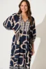 Barrymore Midi Smock Dress In Navy With Beige Border Print sold by St Frock