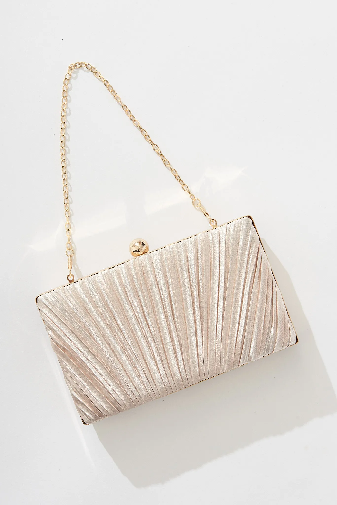 Amina Clutch Bag In Gold sold by St Frock