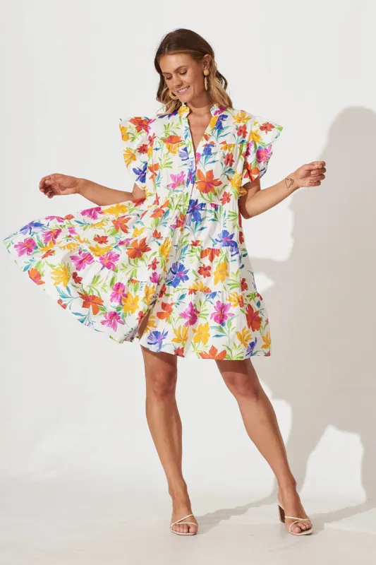 Sarita Smock Dress In White With Bright Floral Print Cotton sold by St Frock