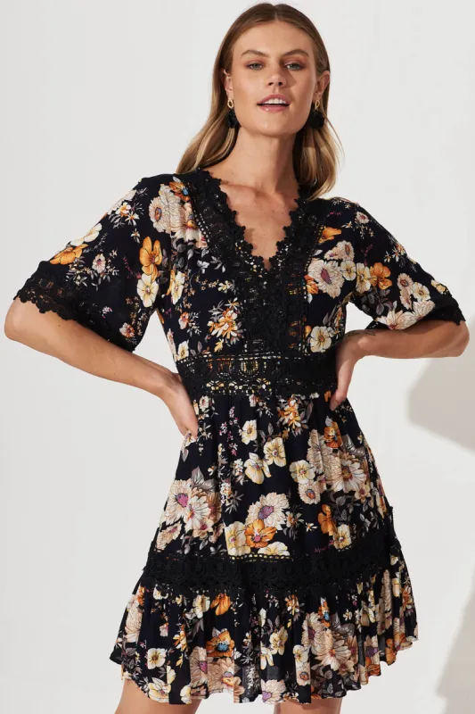 Macca Dress In Ink With Rust Floral sold by St Frock