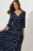 Johanna Maxi Dress In Navy With White Polka Dot sold by St Frock