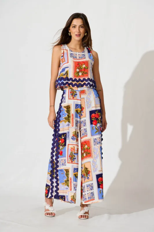 Sandbar Jumpsuit In Blue Multi Postcard Print sold by St Frock