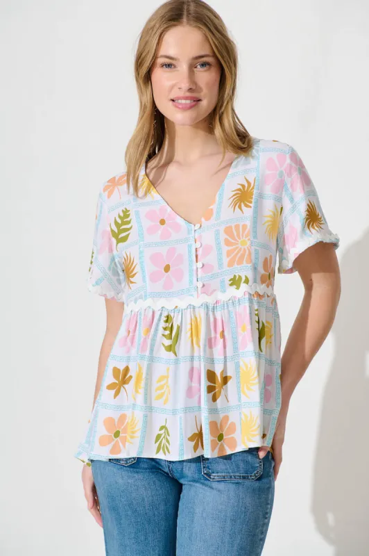 Orlantha Top In Pastel Multi Print With White Ric Rac Trim sold by St Frock