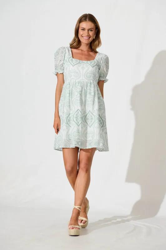 Emmanuelle Dress In White With Green Broderie sold by St Frock