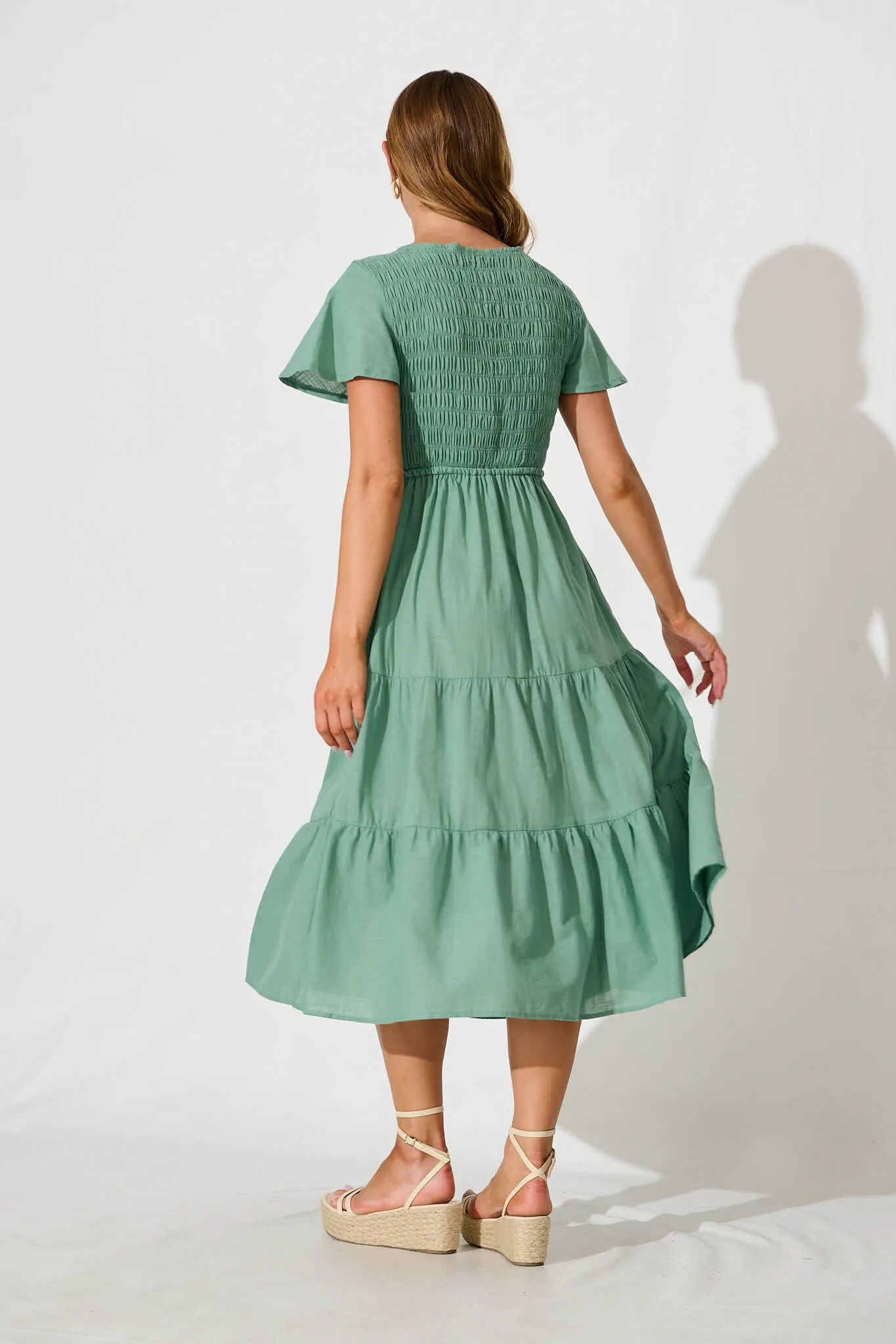 Callie Midi Dress in Sage Linen Blend sold by St Frock product image thumbnail 4