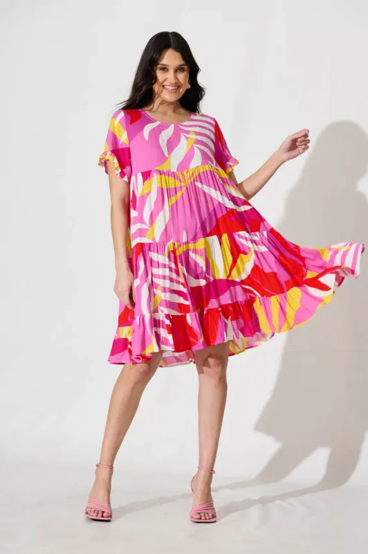 Jacklyn Smock Dress in Multi Pink Graphic Print sold by St Frock