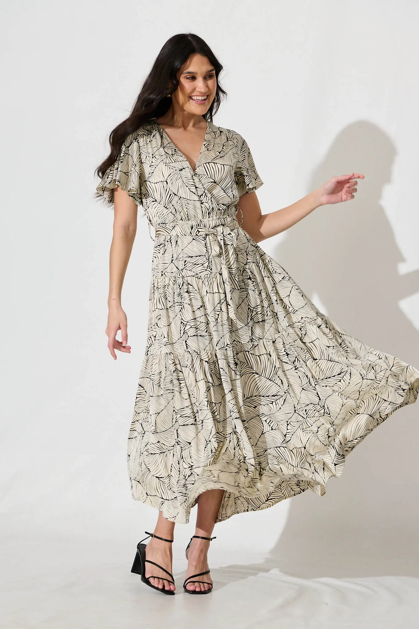 Heidi Maxi Dress in Cream with Black Leaf Satin sold by St Frock